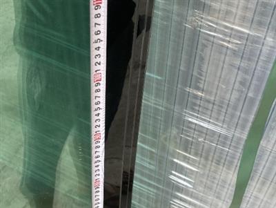 Kính cabin máy xúc lật